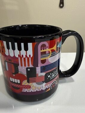 Source Unknown Black Mug with Colorful Music Graphic